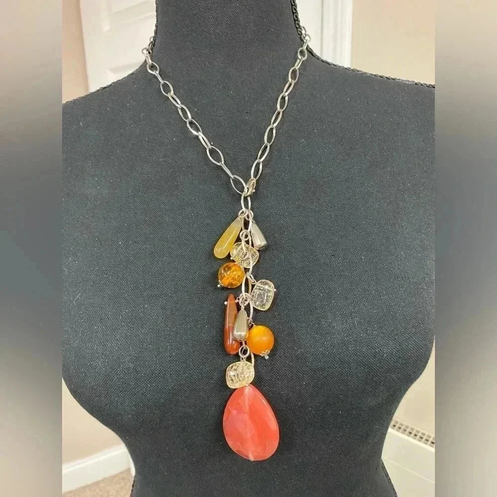 ADJUSTABLE NECKLACE - SILVER AND CORAL-AMBER COLORED BEADS.